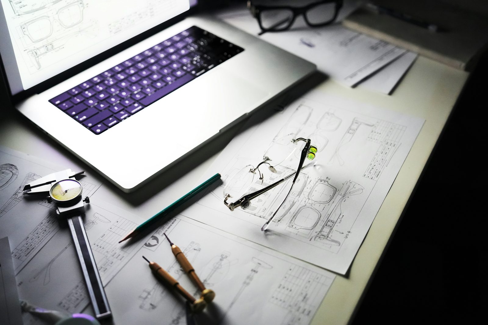 Plans and tools on a professional desk